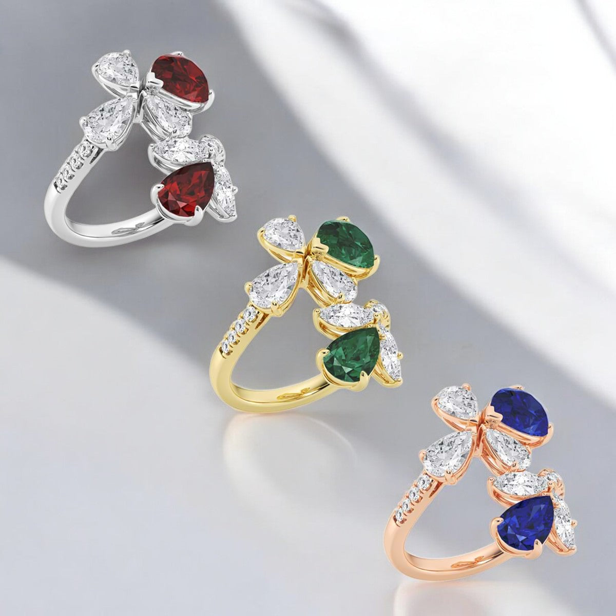 11.48x7.06 mm and 8.5x5.6 mm Pear Shaped Created Sapphire with Mixed Lab Grown Diamond Bypass Fashion Ring