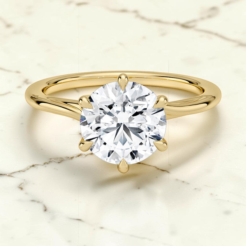 Evangeline Twist Solitaire Ring in 14K Yellow Gold