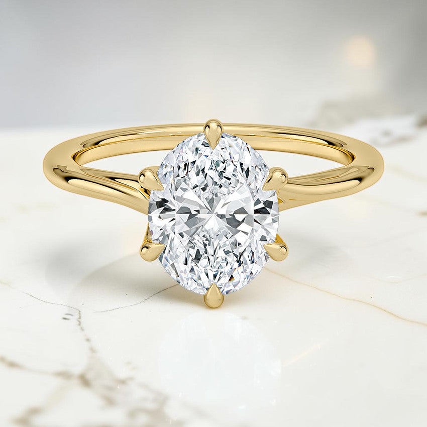 Evangeline Twist Solitaire Ring in 14K Yellow Gold