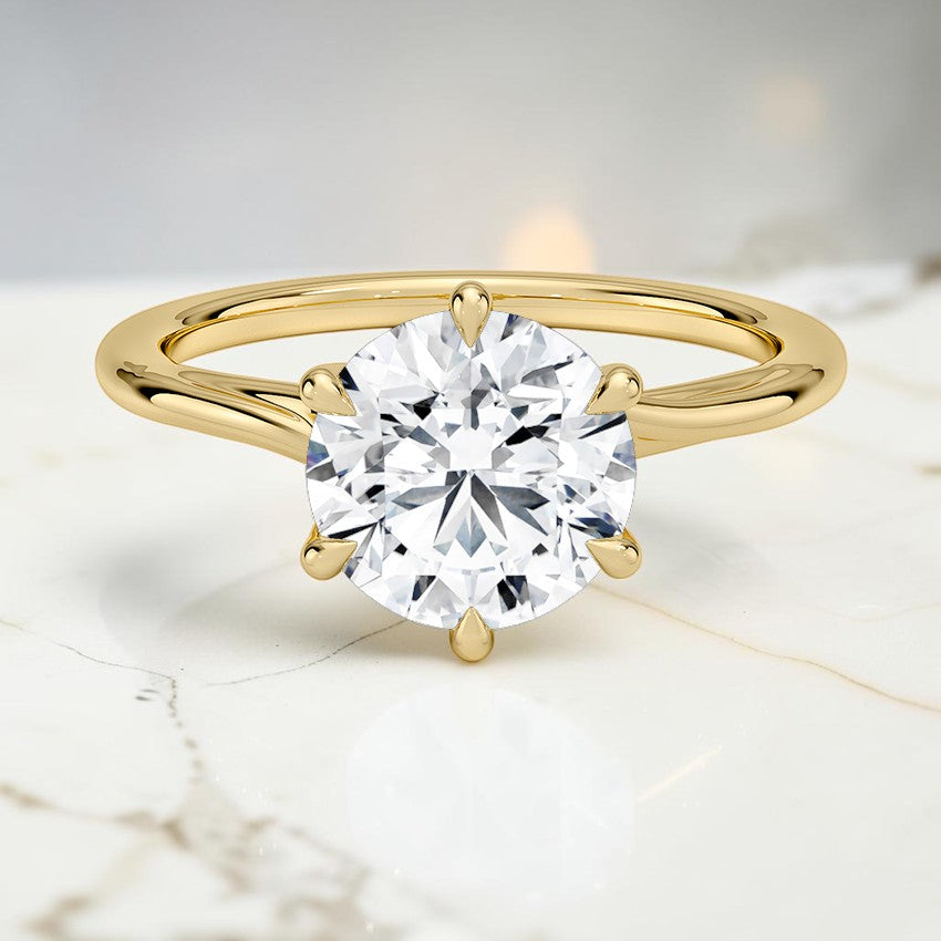 Evangeline Twist Solitaire Ring in 14K Yellow Gold