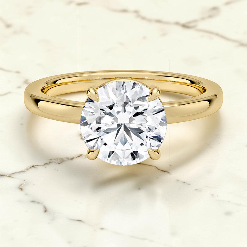 Kira Low-Profile Solitaire Ring in 14K Yellow Gold