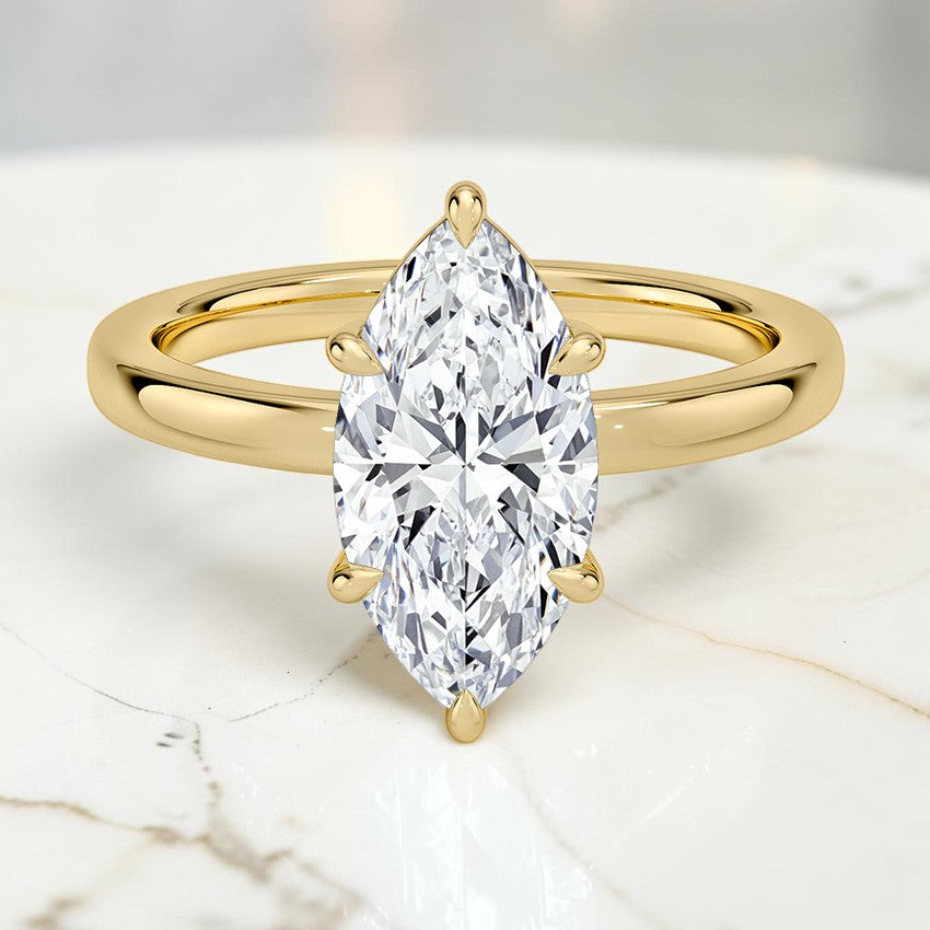 Kira Low-Profile Solitaire Ring in 14K Yellow Gold