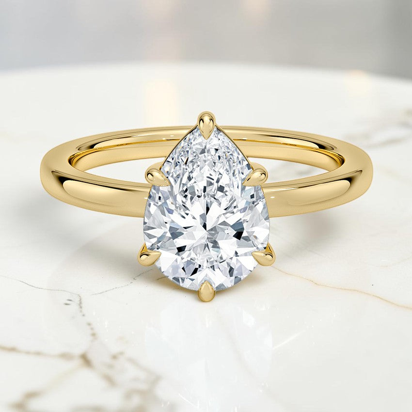 Kira Low-Profile Solitaire Ring in 14K Yellow Gold