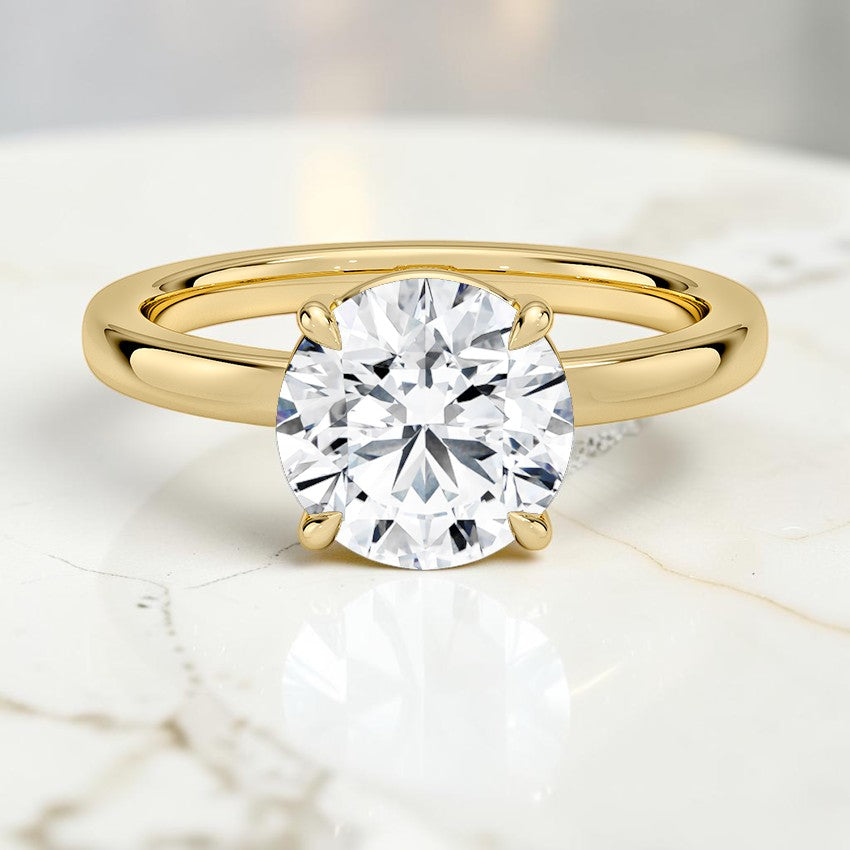 Kira Low-Profile Solitaire Ring in 14K Yellow Gold