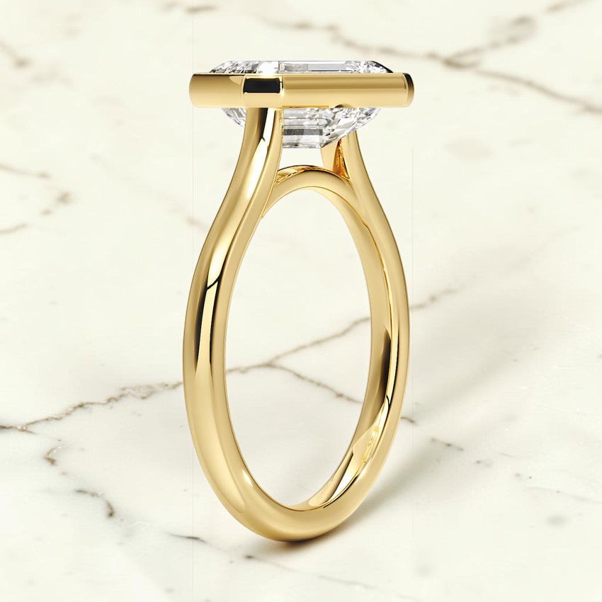 Stella East-West Bezel Solitaire Ring in 14K Yellow Gold