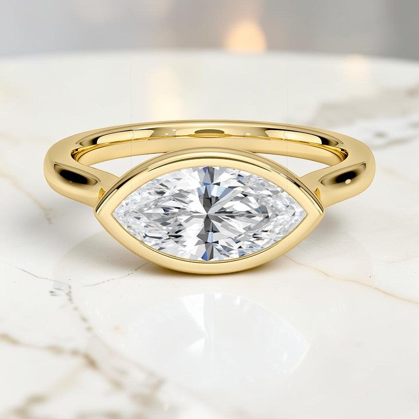 Stella East-West Bezel Solitaire Ring in 14K Yellow Gold