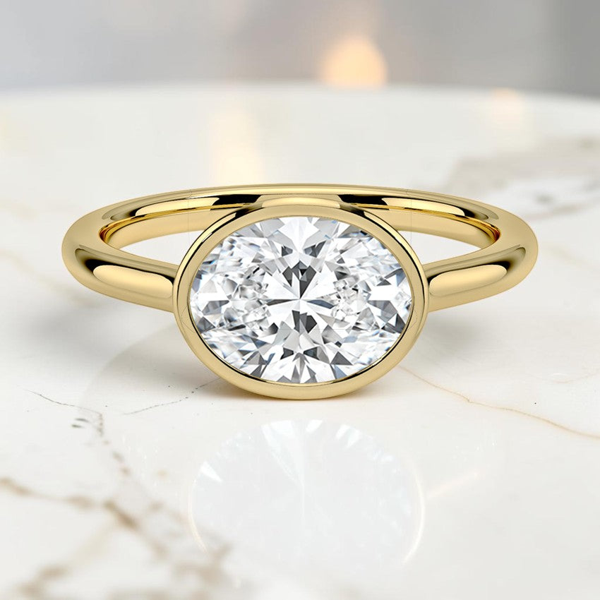 Stella East-West Bezel Solitaire Ring in 14K Yellow Gold