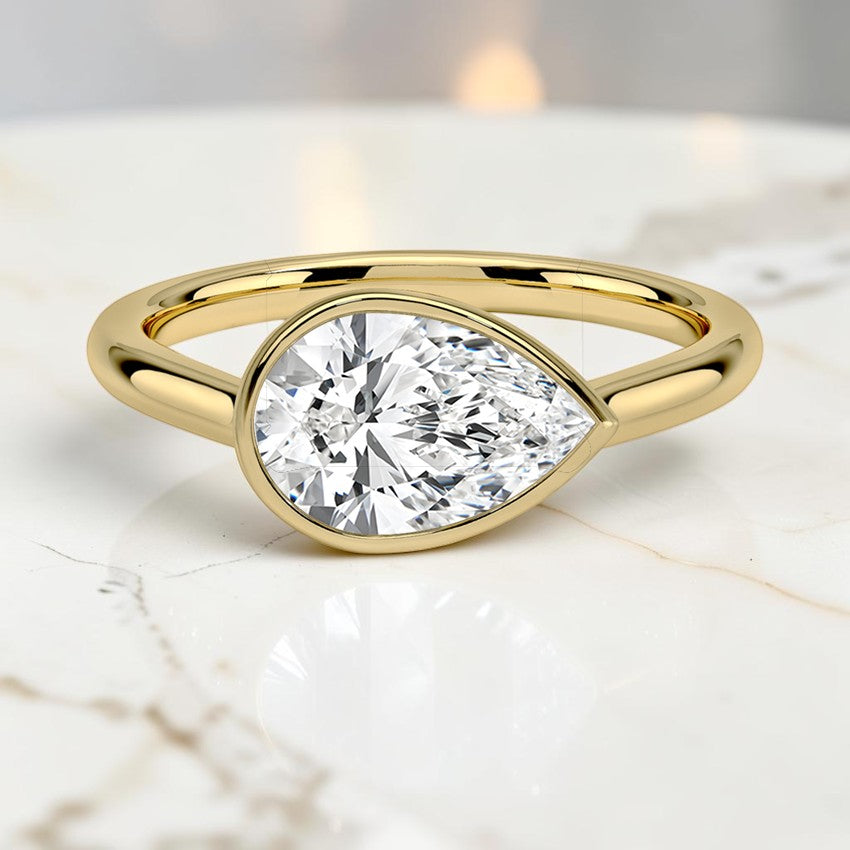 Stella East-West Bezel Solitaire Ring in 14K Yellow Gold