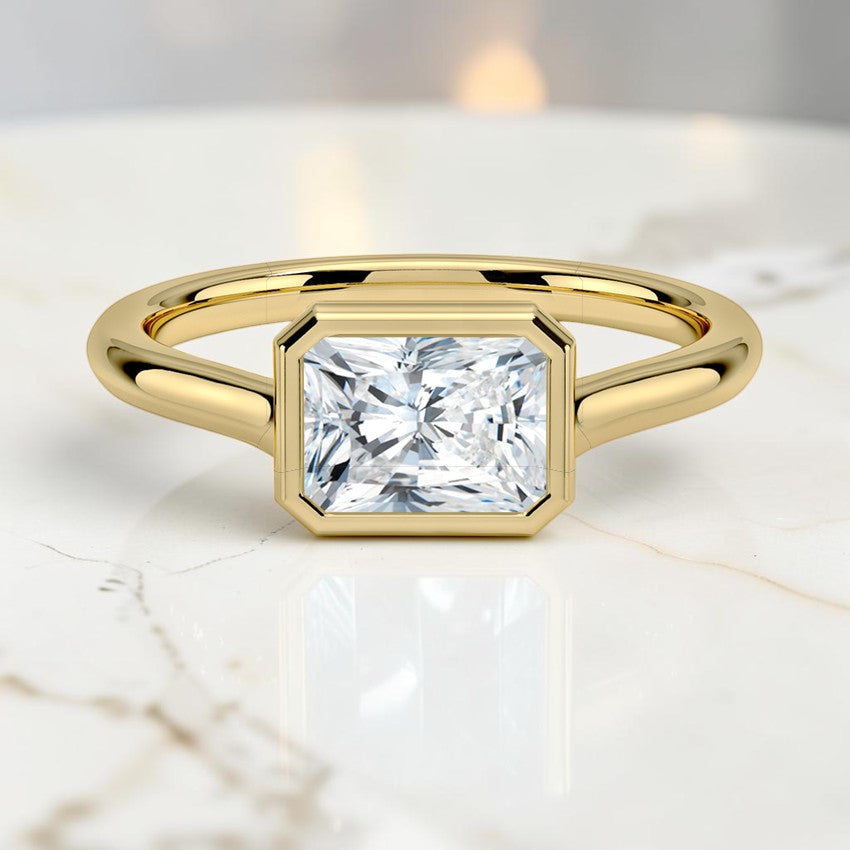 Stella East-West Bezel Solitaire Ring in 14K Yellow Gold