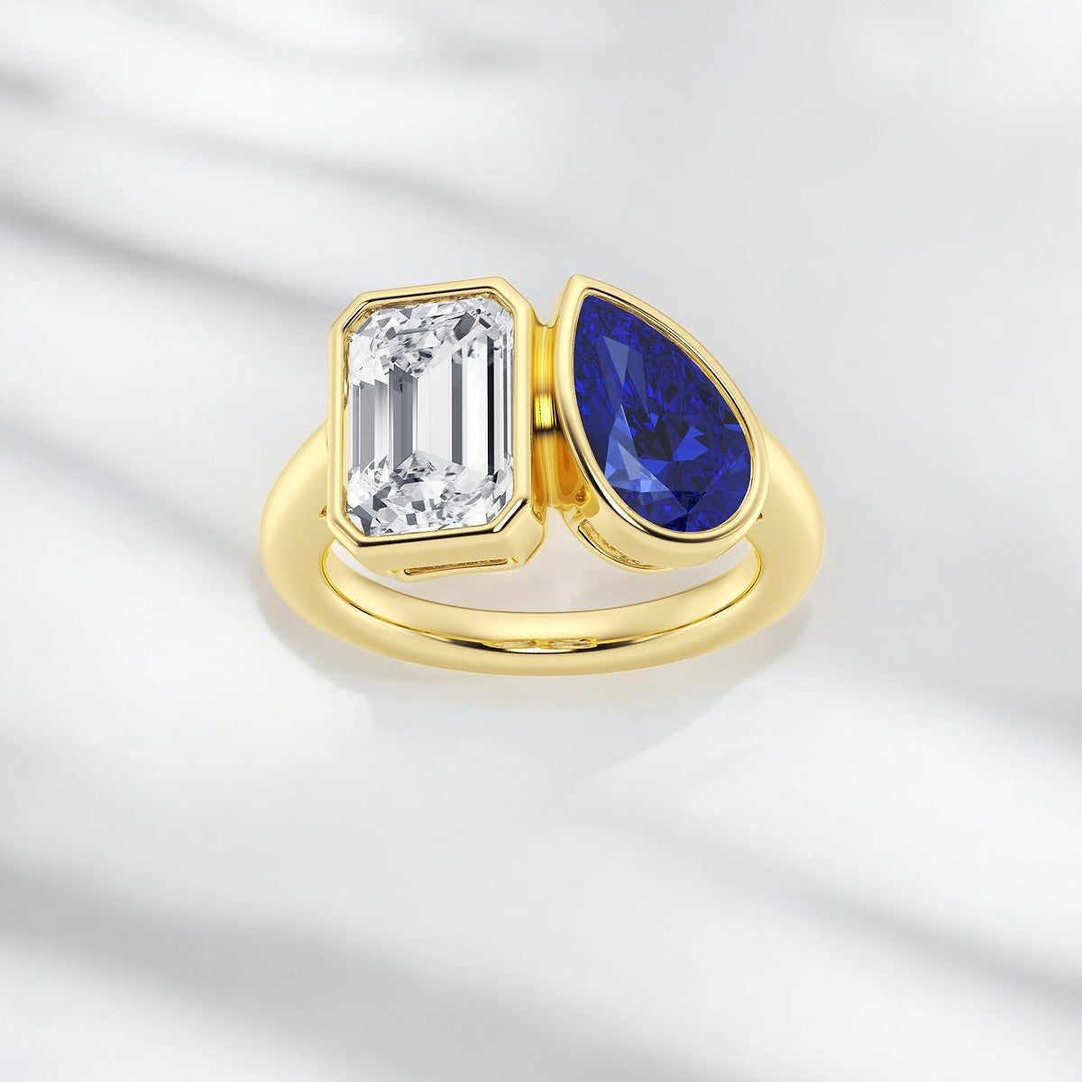 10x6 mm Pear Cut Created Sapphire and Emerald Lab Grown Diamond Bypass Two Stone Fashion Ring