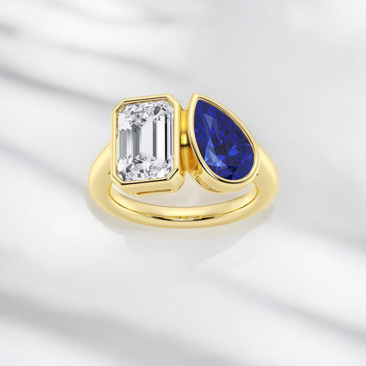 10x6 mm Pear Cut Created Sapphire and Emerald Lab Grown Diamond Bypass Two Stone Fashion Ring